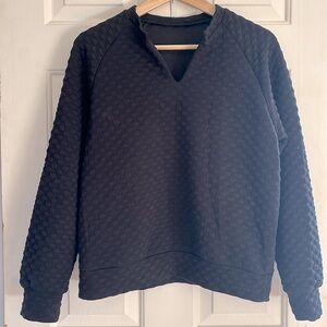 Boutique Black Quilted Sweatshirt. Never worn. Black. Women’s size small
